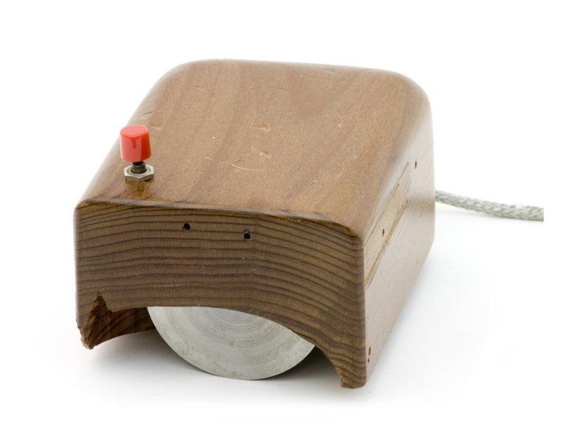 The first mouse was carved from a block of redwood. This exact replica was made by the same shop at SRI which made the original, and is on display in “Revolution.”